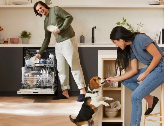 Bosch built-in dishwasher lifestyle showing quiet operation and seamless kitchen integration in a busy home.
